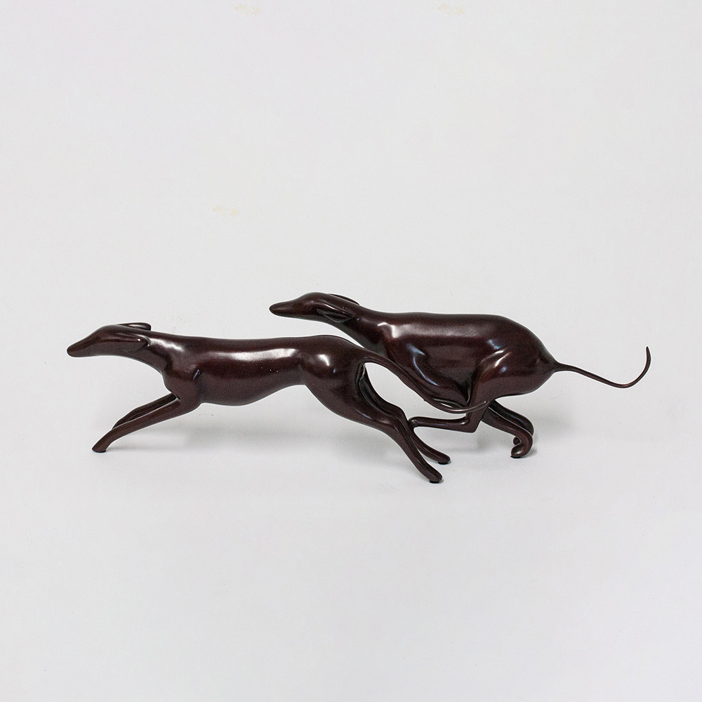 Loet Vanderveen - GREYHOUNDS, RUNNING (303) - BRONZE - 13 X 3 - These sculptures are bronze limited editions.
<br>
<br><a href="/[sculpture]/[available]-[patina]-[swatches]/">More than 30 patinas are available</a>. Available patinas are indicated as IN STOCK. Loet Vanderveen limited editions are always in strong demand and our stocked inventory sells quickly. Special orders are not being taken at this time.
<br>
<br>Allow a few weeks for your sculptures to arrive as each one is thoroughly prepared and packed in our warehouse. This includes fully customized crating and boxing for each piece. Your patience is appreciated during this process as we strive to ensure that your new artwork safely arrives.
<br>
<br>Shipping and Handling TBD