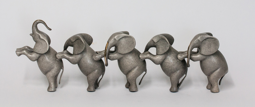 Loet Vanderveen - ELEPHANTS, STANDING LG (373) - BRONZE - 20 X 7 - These sculptures are bronze limited editions.
<br>
<br><a href="/[sculpture]/[available]-[patina]-[swatches]/">More than 30 patinas are available</a>. Available patinas are indicated as IN STOCK. Loet Vanderveen limited editions are always in strong demand and our stocked inventory sells quickly. Special orders are not being taken at this time.
<br>
<br>Allow a few weeks for your sculptures to arrive as each one is thoroughly prepared and packed in our warehouse. This includes fully customized crating and boxing for each piece. Your patience is appreciated during this process as we strive to ensure that your new artwork safely arrives.
<br>
<br>Shipping and Handling TBD