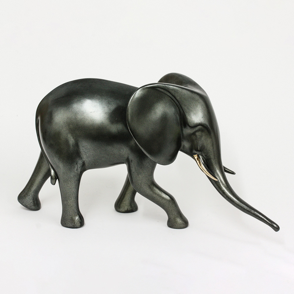 Loet Vanderveen - ELEPHANT, STUDIO (397) - BRONZE - 16 X 9 - These sculptures are bronze limited editions.
<br>
<br><a href="/[sculpture]/[available]-[patina]-[swatches]/">More than 30 patinas are available</a>. Available patinas are indicated as IN STOCK. Loet Vanderveen limited editions are always in strong demand and our stocked inventory sells quickly. Special orders are not being taken at this time.
<br>
<br>Allow a few weeks for your sculptures to arrive as each one is thoroughly prepared and packed in our warehouse. This includes fully customized crating and boxing for each piece. Your patience is appreciated during this process as we strive to ensure that your new artwork safely arrives.
<br>
<br>Shipping and Handling TBD