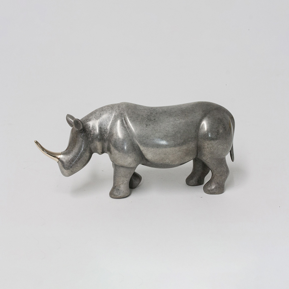 Loet Vanderveen - RHINO, NOAH'S (405) - BRONZE - 7.25 X 3 - These sculptures are bronze limited editions.
<br>
<br><a href="/[sculpture]/[available]-[patina]-[swatches]/">More than 30 patinas are available</a>. Available patinas are indicated as IN STOCK. Loet Vanderveen limited editions are always in strong demand and our stocked inventory sells quickly. Special orders are not being taken at this time.
<br>
<br>Allow a few weeks for your sculptures to arrive as each one is thoroughly prepared and packed in our warehouse. This includes fully customized crating and boxing for each piece. Your patience is appreciated during this process as we strive to ensure that your new artwork safely arrives.
<br>
<br>Shipping and Handling TBD