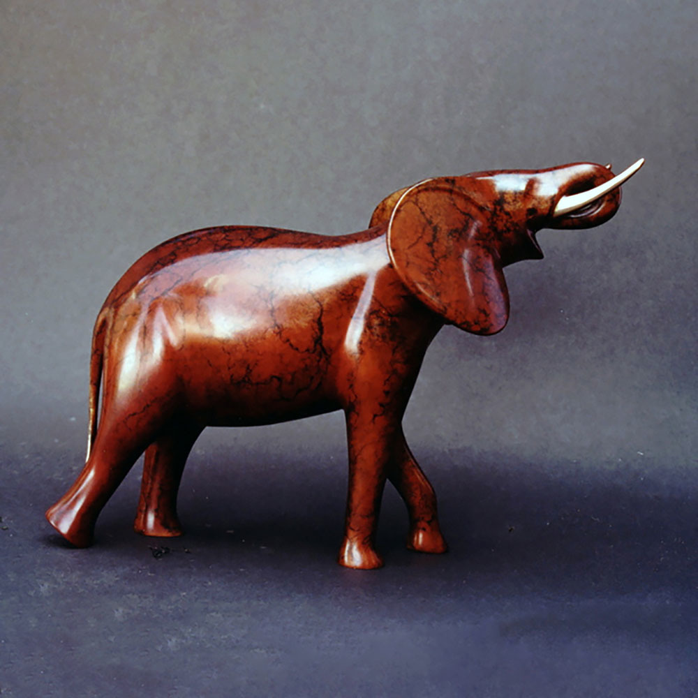 Loet Vanderveen - ELEPHANT, DRINKING LG (421) - BRONZE - 15 X 10.75 - These sculptures are bronze limited editions.
<br>
<br><a href="/[sculpture]/[available]-[patina]-[swatches]/">More than 30 patinas are available</a>. Available patinas are indicated as IN STOCK. Loet Vanderveen limited editions are always in strong demand and our stocked inventory sells quickly. Special orders are not being taken at this time.
<br>
<br>Allow a few weeks for your sculptures to arrive as each one is thoroughly prepared and packed in our warehouse. This includes fully customized crating and boxing for each piece. Your patience is appreciated during this process as we strive to ensure that your new artwork safely arrives.
<br>
<br>Shipping and Handling TBD