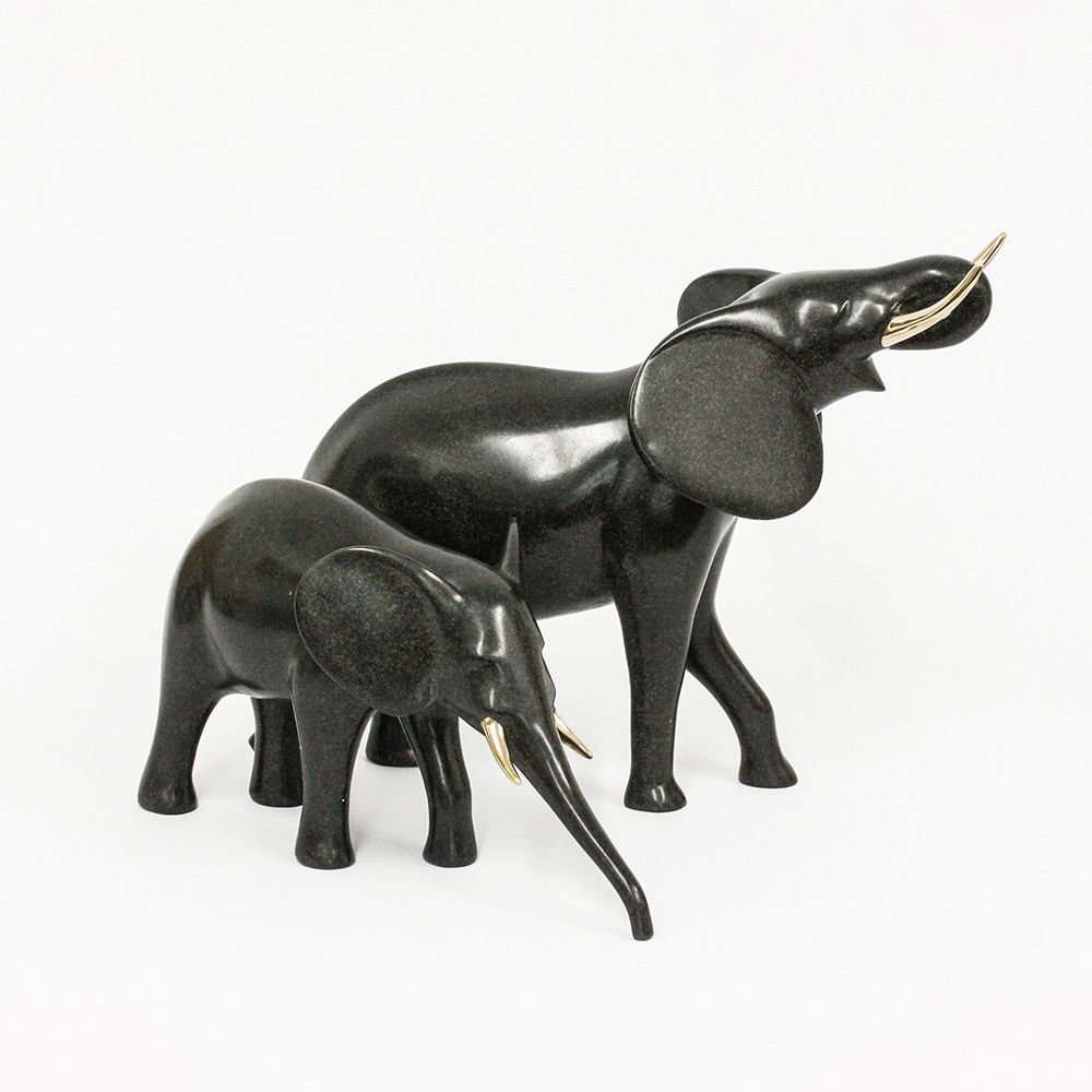 Loet Vanderveen - ELEPHANT PAIR, DRINKING (425) - BRONZE - 16 X 11.5 - These sculptures are bronze limited editions.
<br>
<br><a href="/[sculpture]/[available]-[patina]-[swatches]/">More than 30 patinas are available</a>. Available patinas are indicated as IN STOCK. Loet Vanderveen limited editions are always in strong demand and our stocked inventory sells quickly. Special orders are not being taken at this time.
<br>
<br>Allow a few weeks for your sculptures to arrive as each one is thoroughly prepared and packed in our warehouse. This includes fully customized crating and boxing for each piece. Your patience is appreciated during this process as we strive to ensure that your new artwork safely arrives.
<br>
<br>Shipping and Handling TBD