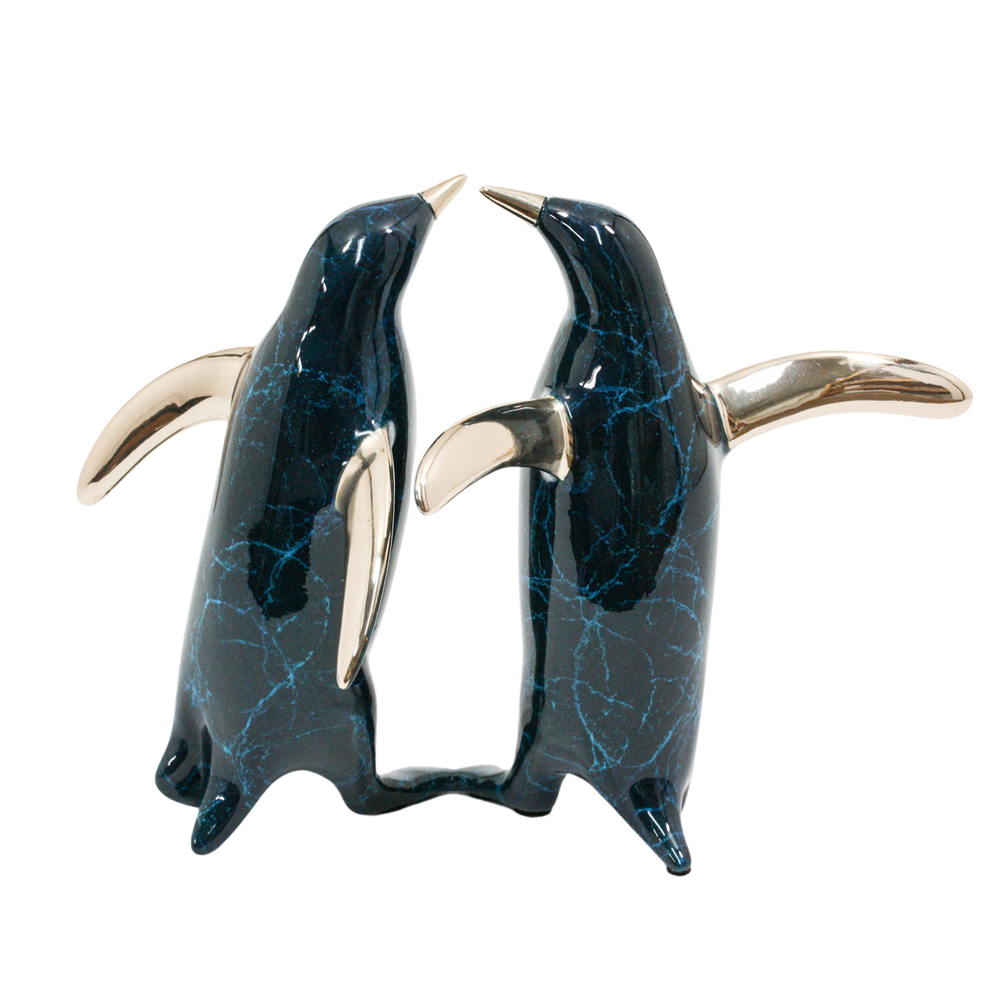 Loet Vanderveen - PENGUIN PAIR (472) - BRONZE - 7 X 4.5 X 5.25 - These sculptures are bronze limited editions.
<br>
<br><a href="/[sculpture]/[available]-[patina]-[swatches]/">More than 30 patinas are available</a>. Available patinas are indicated as IN STOCK. Loet Vanderveen limited editions are always in strong demand and our stocked inventory sells quickly. Special orders are not being taken at this time.
<br>
<br>Allow a few weeks for your sculptures to arrive as each one is thoroughly prepared and packed in our warehouse. This includes fully customized crating and boxing for each piece. Your patience is appreciated during this process as we strive to ensure that your new artwork safely arrives.
<br>
<br>Shipping and Handling TBD