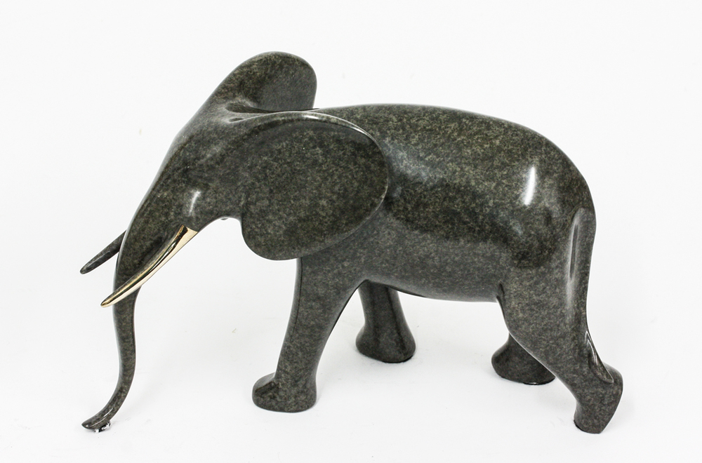 Loet Vanderveen - ELEPHANT, WALKING (530) - BRONZE - 9.5 X 5 X 6.25 - These sculptures are bronze limited editions.
<br>
<br><a href="/[sculpture]/[available]-[patina]-[swatches]/">More than 30 patinas are available</a>. Available patinas are indicated as IN STOCK. Loet Vanderveen limited editions are always in strong demand and our stocked inventory sells quickly. Special orders are not being taken at this time.
<br>
<br>Allow a few weeks for your sculptures to arrive as each one is thoroughly prepared and packed in our warehouse. This includes fully customized crating and boxing for each piece. Your patience is appreciated during this process as we strive to ensure that your new artwork safely arrives.
<br>
<br>Shipping and Handling TBD
