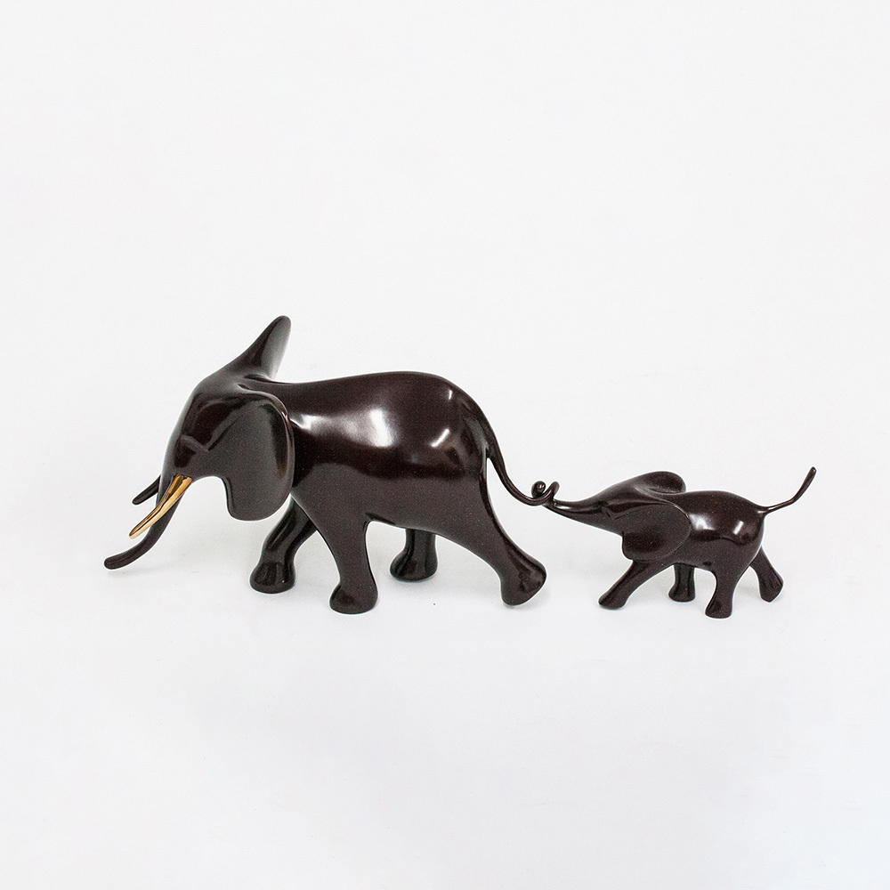 Loet Vanderveen - ELEPHANT & BABY MARCHING (547) - BRONZE - 13 X 4.25 X 4.5 - These sculptures are bronze limited editions.
<br>
<br><a href="/[sculpture]/[available]-[patina]-[swatches]/">More than 30 patinas are available</a>. Available patinas are indicated as IN STOCK. Loet Vanderveen limited editions are always in strong demand and our stocked inventory sells quickly. Special orders are not being taken at this time.
<br>
<br>Allow a few weeks for your sculptures to arrive as each one is thoroughly prepared and packed in our warehouse. This includes fully customized crating and boxing for each piece. Your patience is appreciated during this process as we strive to ensure that your new artwork safely arrives.
<br>
<br>Shipping and Handling TBD