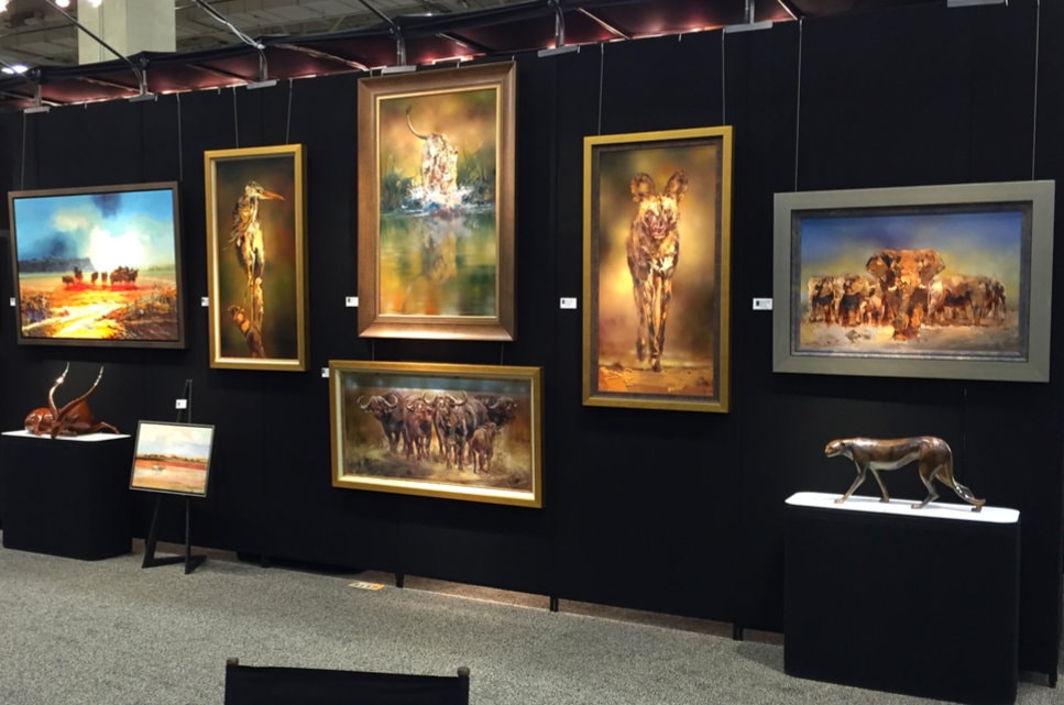 Giclee Prints on Wall at an Art Show